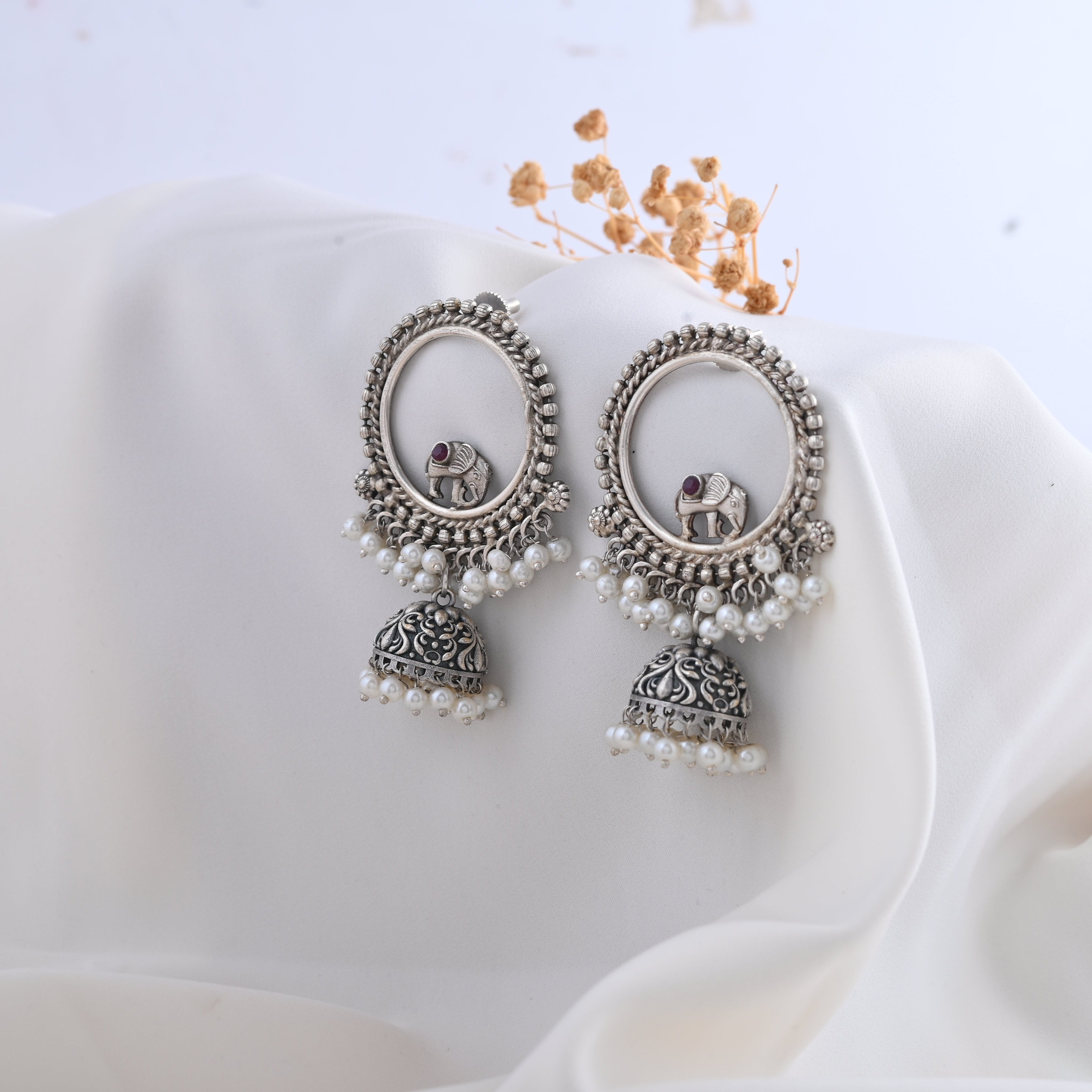 Vibrant Veils Hand Crafted Circled with Elephant Silver Replica Earing With Pearls