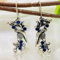 Vibrant Veils Bird Inspired Tribal Monalisa Stone Jhumki Earing