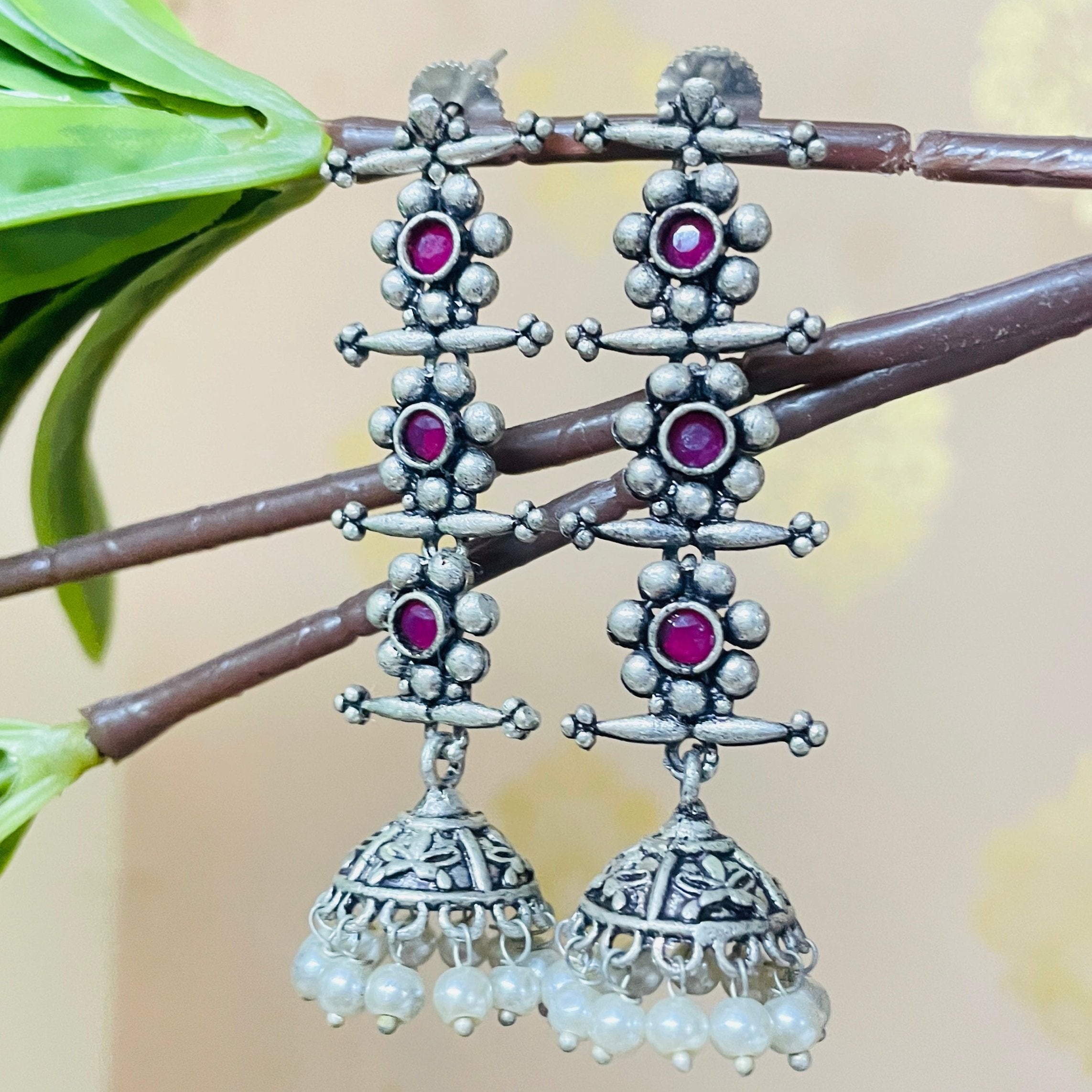 Vibrant Veils Long, dangling design with stones and pearls Earing