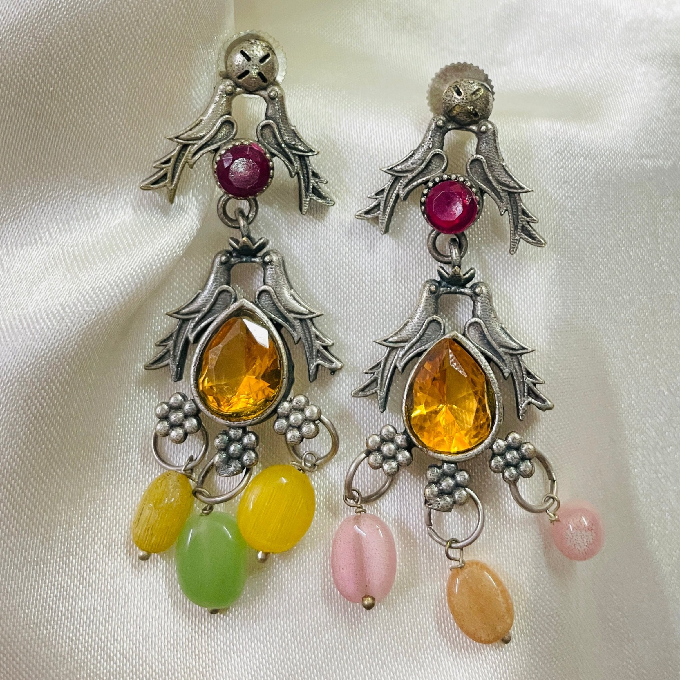 Vibrant Veils Dangling design with multiple tiers of Beads and Stones.