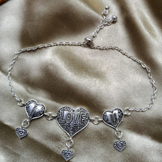 Vibrant Veils Triple Heart Harmony Bracelet