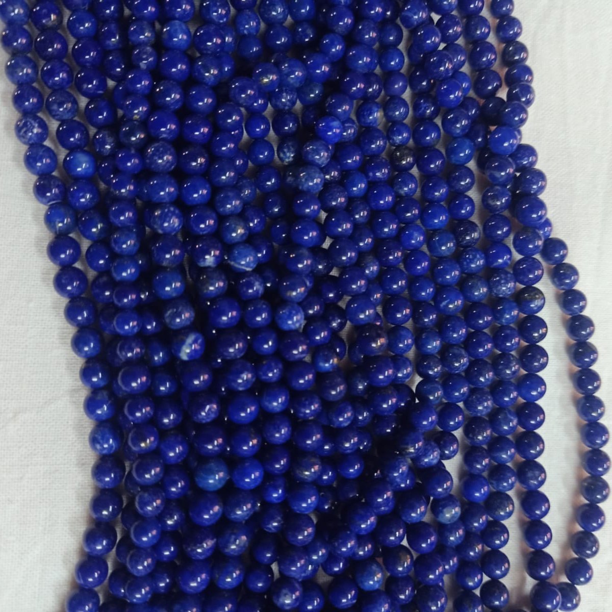 Vibrant Veils Lapis Lazuli Round Beads