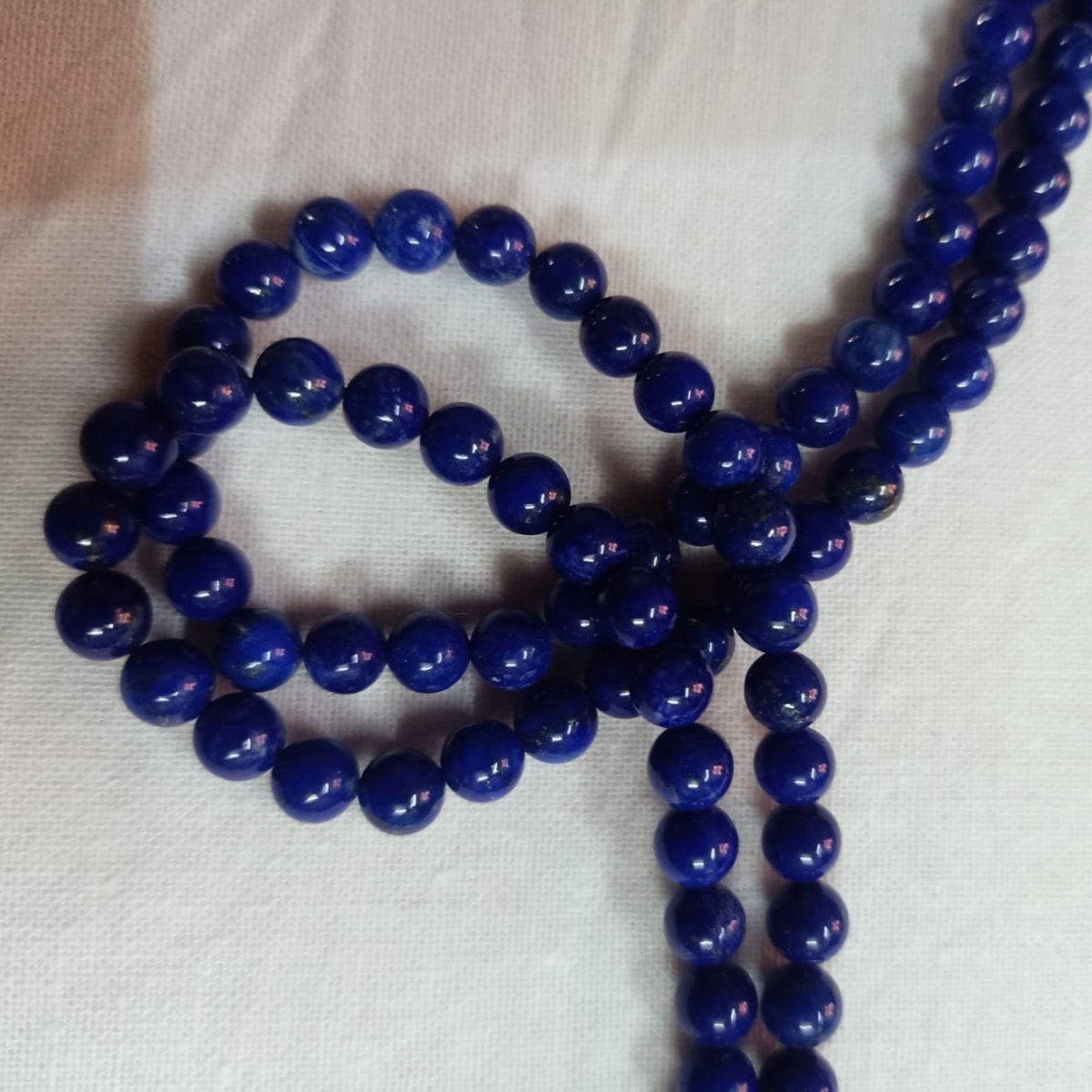 Vibrant Veils Lapis Lazuli Round Beads