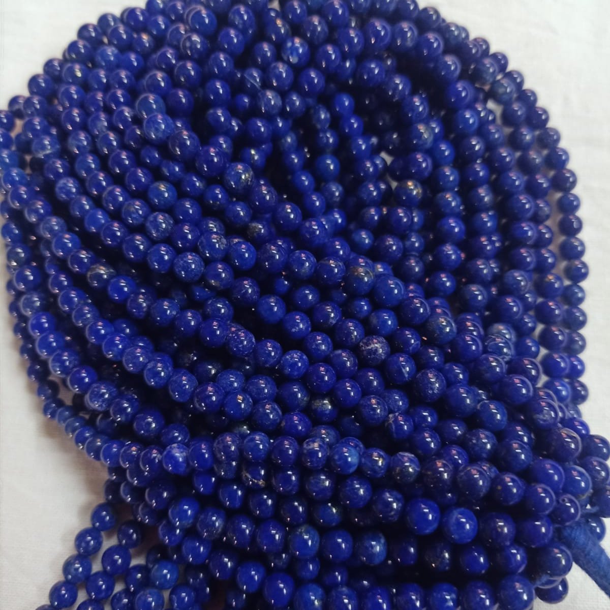 Vibrant Veils Lapis Lazuli Round Beads