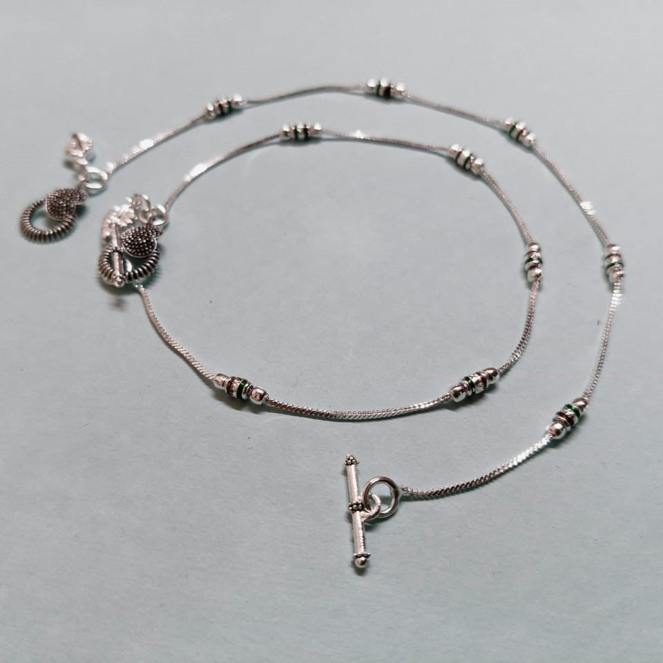 VIBRANT VEILS Oxidised Silver Designer Anklet with Intricate Charm