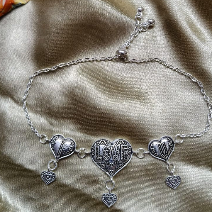 Vibrant Veils Triple Heart Harmony Bracelet